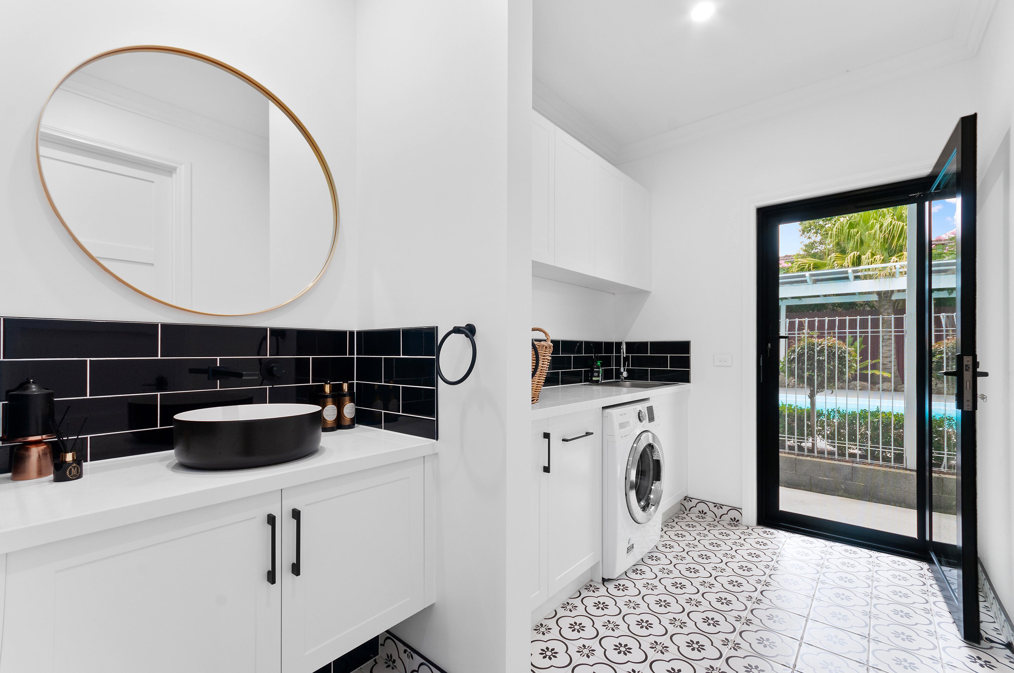 KITCHEN, POWDER ROOM AND LAUNDRY